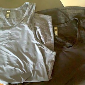 2 for 1 Victoria’s Secret Sport mesh active tanks.